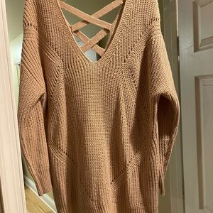 Super comfy sweater with crosses in the back